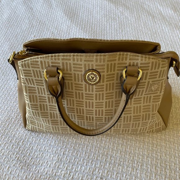 Handbags - Anne Klein Engraved Lion Logo Gold-Tone Zippered Clutch